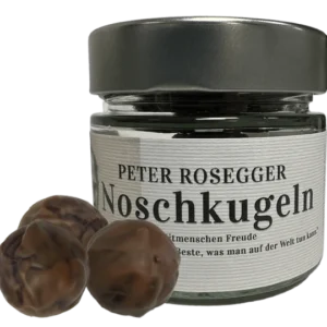 Ein Glas voll mit Noschkugel, handgemachte Pralinen zu ehren von Peter Roseggers Geburtstag